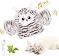 Grey owl-shaped automatic cat toy with flapping wings on a flat surface