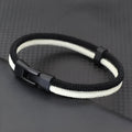 Handmade woven Milan rope hand strap body bag in black and white with alloy hardware available in 19cm 21cm 23cm sizes