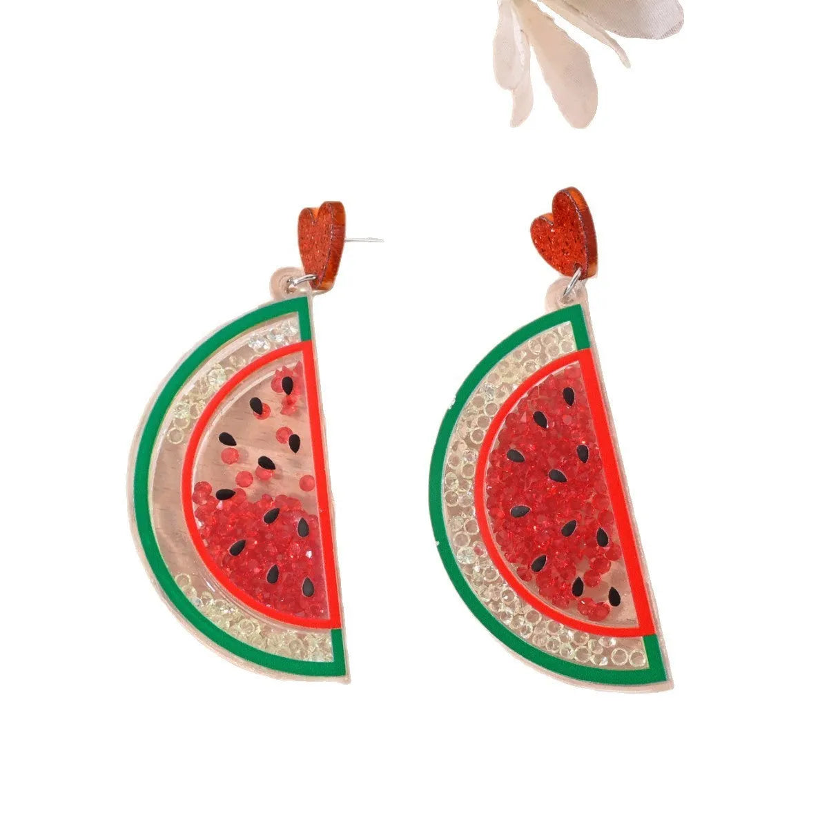 Colourful acrylic fruit and ice cream dangle earrings for women on a white background.