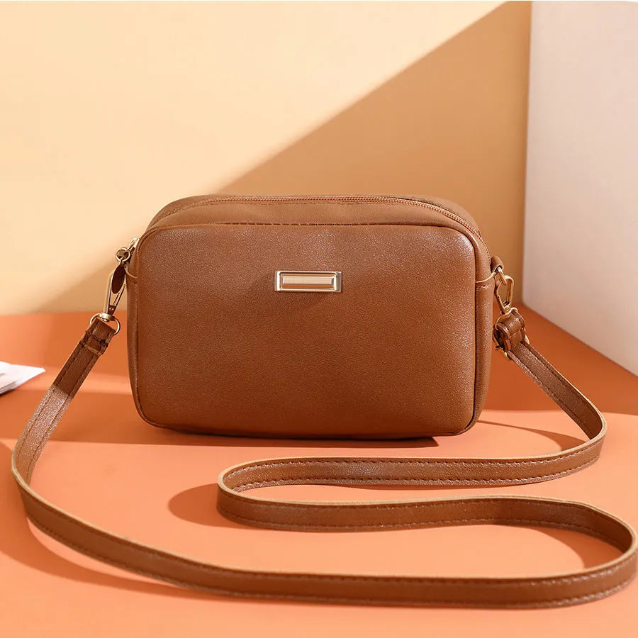 Women's solid colour PU leather shoulder bag with three-dimensional pockets in five colour options